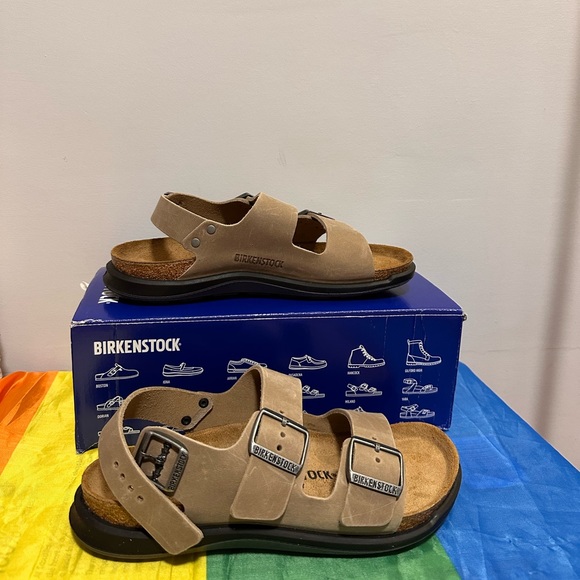 Shoes - Birkenstock Crosstown sandals new and never use. Too big fr my size. 200cad